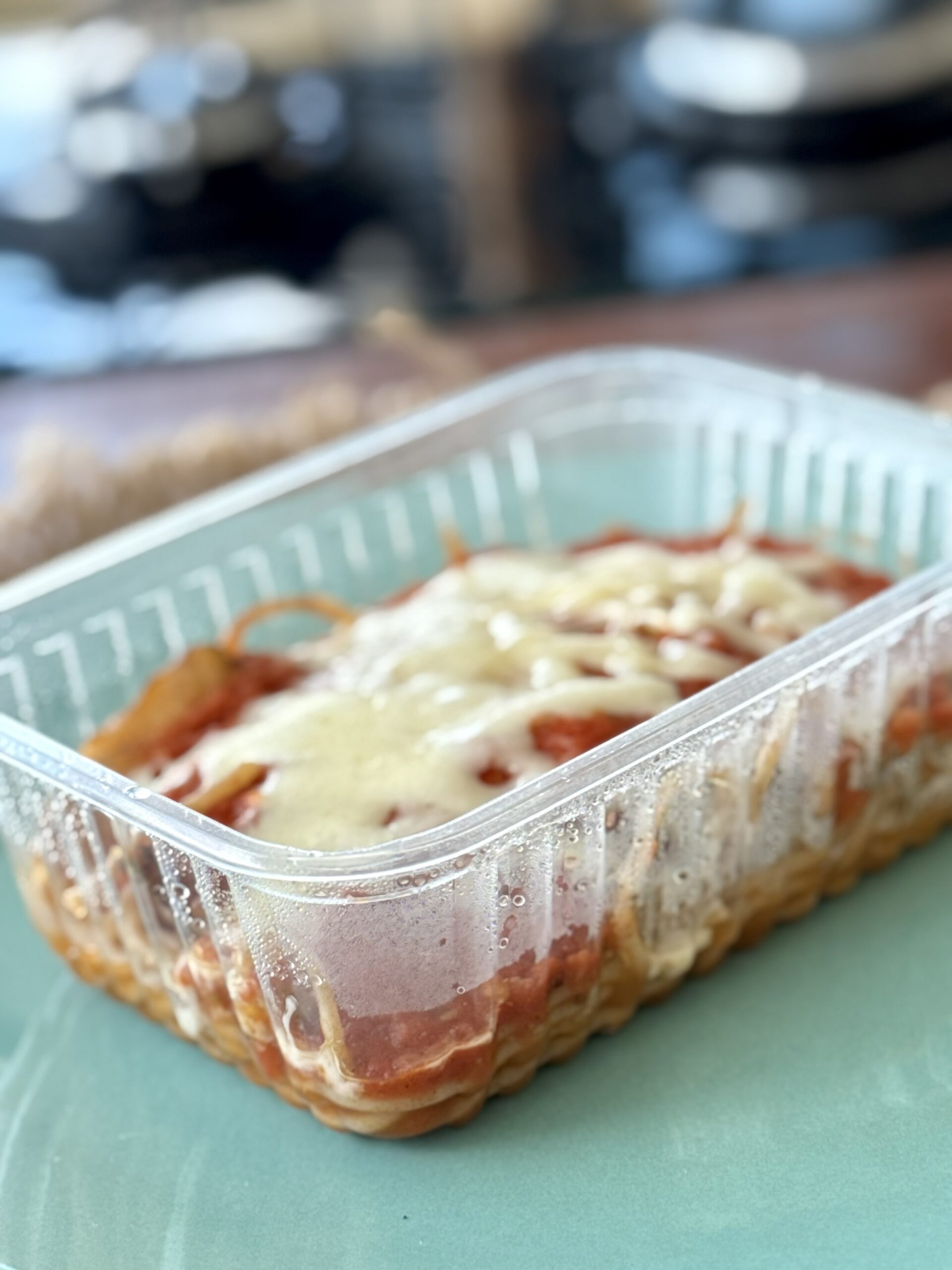 Parmegiana de frango com spaghetti integral